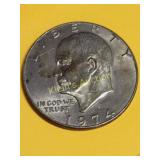 1974D ike dollar error filled in D & die rotation