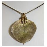 silvertone 23" vintage necklace w./gold tone leaf