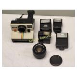 Polaroid land camera, 35mm camera lens &++