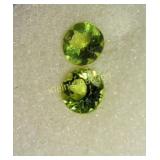 pair of round cut 4.7 mm Peridot gemstones