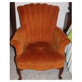 Orange upholstered armchair