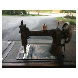 Antique white sewing machine