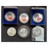 Silver American Eagle silver dollars including painted