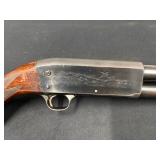 #320  2 3/4 inch chamber pump action shotgun 