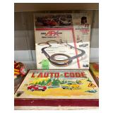 #935 NIB Lot of 2 Incl. L’ Auto-Code board game & Jackie Stewart Golden Gate Race  Set by Auora 