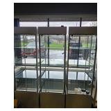 5 glass display cabinets (four-sided, like new condition)
