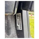 Lot #1111 (54) Close up of SER # Tag
