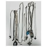 #5221Large Lot of Silver Chains, Cameos, Cross, etc.
