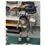 Recycled metal man statue featuring countdown timer 