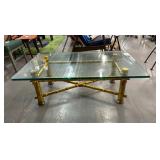 #542 Hollywood Regency Faux Bamboo Coffee Table with a Gilt Leaf Finish and heavy Rounded Glass