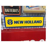 #693 New Holland 2 Color Single Sided Embossed Tin Sign with Raised Frame-Approx Dimensions: 12"x42"