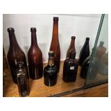 #1460 Group of 12 Brewing & Medicine Brown Glass Bottles
