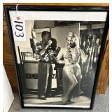#103  Black and White Photo of Earl Moran with Pin -up Hula Girl model signed by Earl Moran