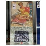 #134 Advertising Pin-up Calendar 1962 (woman in yellow dress on lounge chair)