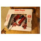 Slik Toys in box