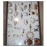 #53 Nice lot of watches, belt buckles, etc.