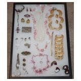 #61 Glass case of jewelry