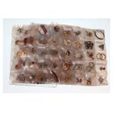 #80 Large lot of packaged pendants, earrings, etc.