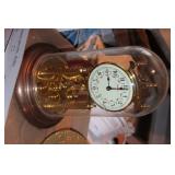 Kundo clock in glass globe