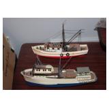2 plastic model boats
