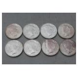 (8) 1923 AU Peace Silver Dollars