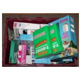 Boxes of t-shirts, sunglasses, etc.