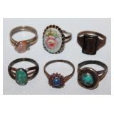 several sterling silver rings