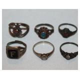 several sterling silver rings