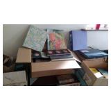 multiple boxes of empty photo albums