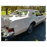 White exterior with red line 