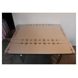 Porcelain top drop leaf table Porcelain top drop leaf table