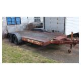 Dual axel flatbed car hauling trailer