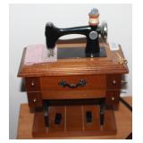 Toy sewing machine