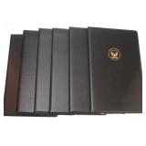 4 $2 bills uncut in books- (6)