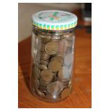 Small jar of wheat pennies