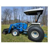 Ford -New Holland 1920 with 7308 Loader