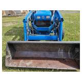 Ford -New Holland 1920 with 7308 Loader