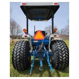 Ford -New Holland 1920 with 7308 Loader
