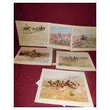 TWO SETS OF CHARLES RUSSELL ART PRINTS IN FOLDERS