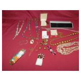 SOME 925. PIECES ASSORTED COSTUME NECKLACES CLIP