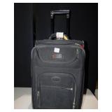 DELSEY LUGGAGE WITH WHEELS FITS IN OVERHEAD