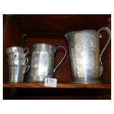 ALUMINUM WATER PITCHER MARKED "CENTURY", HAMMERED