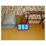 LAMP, LUGGAGE RACK, THROW PILLOWS