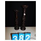 TWO COMPOSITION CANDLE STANDS 18" AND 22"