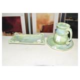 GREEN POTTERY APPLIED HANDLE AND PLATE