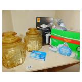 2 GLASS JARS WITH COTTON BALLS AND BATHROOM