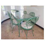WROUGHT IRON GLASS TOP TABLE AND 6 CHAIRS 32" X