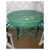 GREEN WICKER TABLETOP IS A LITTLE DISTRESSED 28"