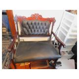 TUFTED BLACK SETTEE WITH APPLIED CARVING ON TOP