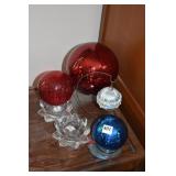 TWO RED GAZING BALLS, ONE BLUE, CANDLE HOLDERS